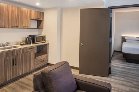 Premium bedding, down comforters, in-room safe, desk