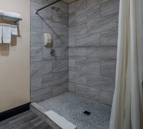 Room, 1 King Bed, Smoking | Bathroom | Free toiletries, towels