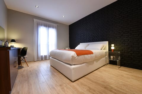 Deluxe Room (Twin Beds x2 Available on Request) | Minibar, in-room safe, desk, blackout drapes