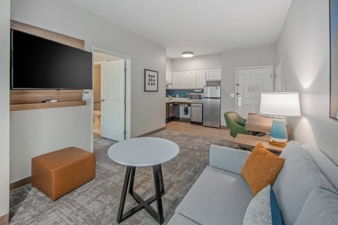 Desk, laptop workspace, blackout drapes, iron/ironing board