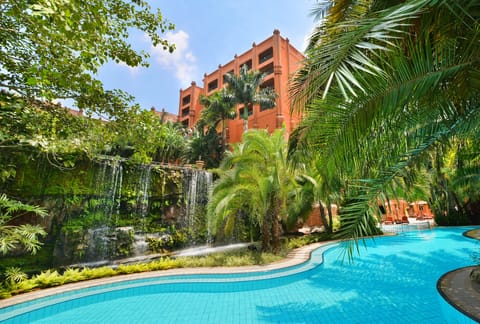 Outdoor pool, open 6:00 AM to 6:00 PM, pool umbrellas, sun loungers