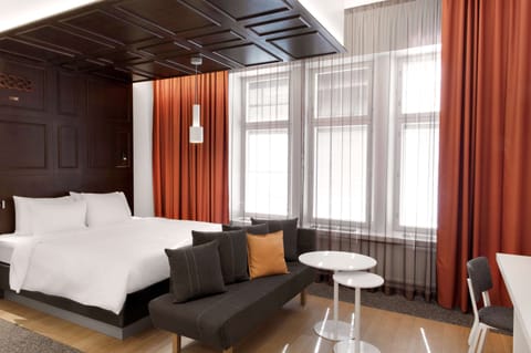 Premium bedding, down comforters, memory foam beds, minibar