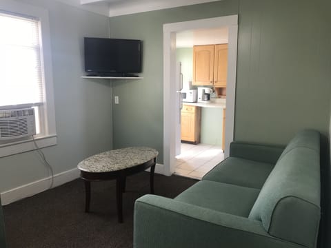 Apartment, 2 Bedrooms, Balcony (A06) | Living room | Flat-screen TV