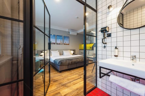 Superior Studio Suite, 1 Bedroom, Kitchenette, City View | Bathroom | Shower, rainfall showerhead, eco-friendly toiletries, hair dryer