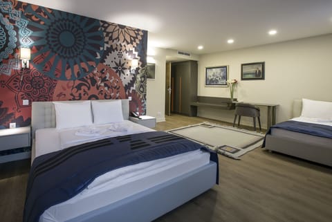 Minibar, desk, blackout drapes, soundproofing