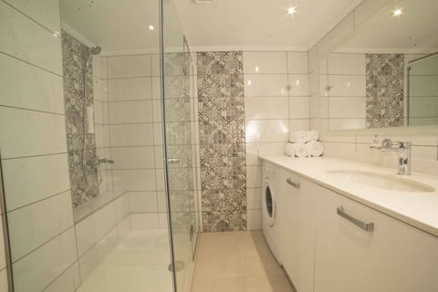 Design Apartment, 1 Bedroom, Terrace, Sea Facing (Mimosa) | Bathroom | Shower, free toiletries, hair dryer, bathrobes