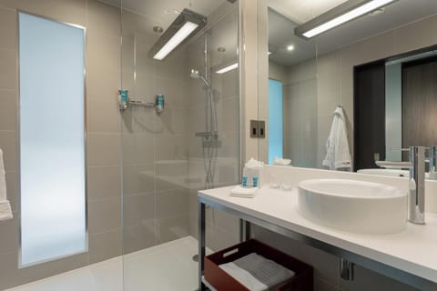 Shower, rainfall showerhead, designer toiletries, hair dryer