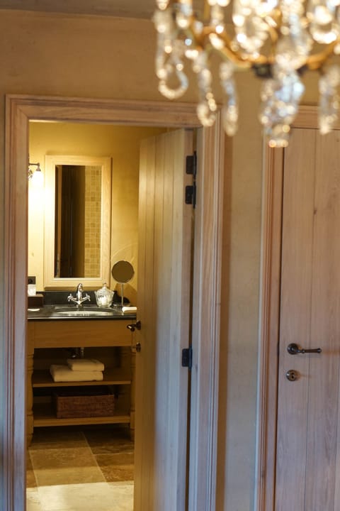 Separate tub and shower, rainfall showerhead, designer toiletries