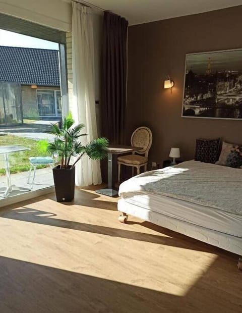 Desk, blackout drapes, soundproofing, iron/ironing board