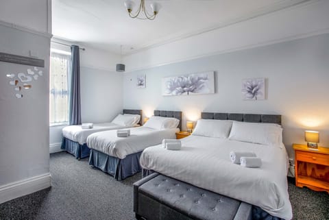 Family Quadruple Room, Ensuite | Premium bedding, desk, blackout drapes, iron/ironing board