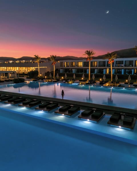 Indoor pool, 4 outdoor pools, open 10 AM to 6 PM, pool umbrellas