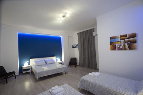 Quadruple Room | Premium bedding, down comforters, pillowtop beds, desk