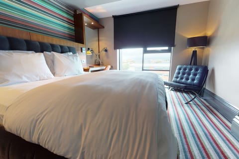 Desk, laptop workspace, blackout drapes, iron/ironing board