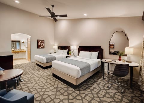 Premium bedding, down comforters, pillowtop beds, in-room safe