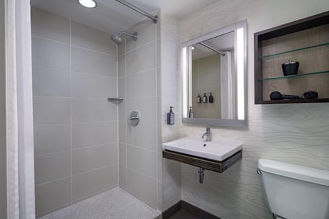 Designer toiletries, hair dryer, bathrobes, towels