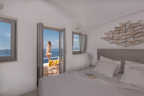 Junior Suite ( Caldera View) | Living area | 30-inch flat-screen TV with satellite channels, TV