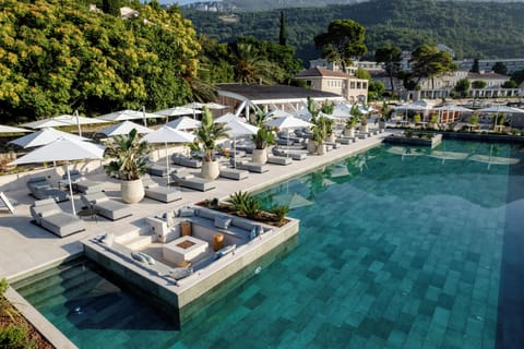 On the beach, sun loungers, beach umbrellas, beach towels