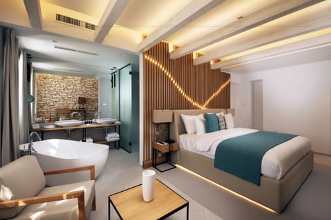 King suite with sea view in Historical building | Premium bedding, free minibar items, in-room safe, desk