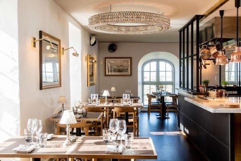 2 restaurants, breakfast, lunch, dinner served; local cuisine