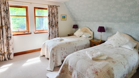 Twin Room, Private Bathroom | Blackout drapes, free WiFi, bed sheets