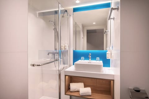 Shower, rainfall showerhead, eco-friendly toiletries, hair dryer