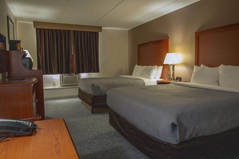 Down comforters, desk, blackout drapes, iron/ironing board