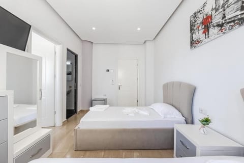 Family Room | Minibar, in-room safe, iron/ironing board, free WiFi