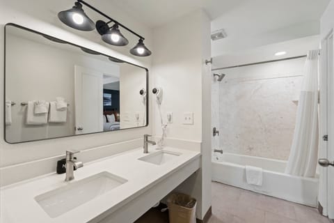 Single Room, 2 Queen Beds, Non Smoking | Bathroom | Combined shower/tub, hair dryer, towels