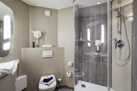 Shower, eco-friendly toiletries, hair dryer, towels