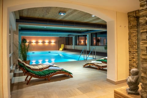 Indoor pool, open 8:00 AM to 8:30 PM, pool umbrellas, sun loungers