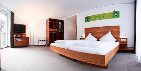 In-room safe, desk, iron/ironing board, free cribs/infant beds