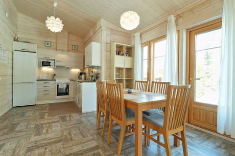 Family Villa, 2 Bedrooms, Sauna, Lakeside | Living area | 32-inch LED TV with digital channels, Smart TV, fireplace