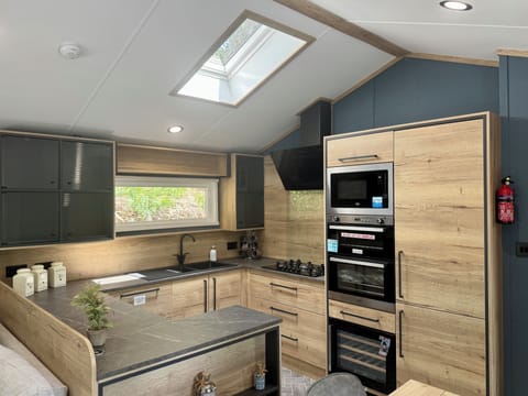 Waterfall Lodge 2 bedroom-No Pets | Private kitchen | Full-size fridge, microwave, oven, stovetop