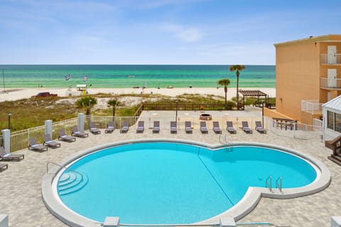 Outdoor pool, open 9:00 AM to 10:00 PM, sun loungers
