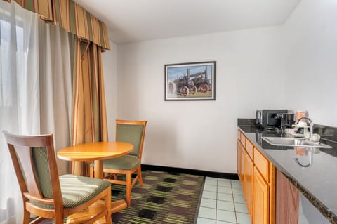 Suite, 1 King Bed, Non Smoking | Private kitchen | Coffee/tea maker