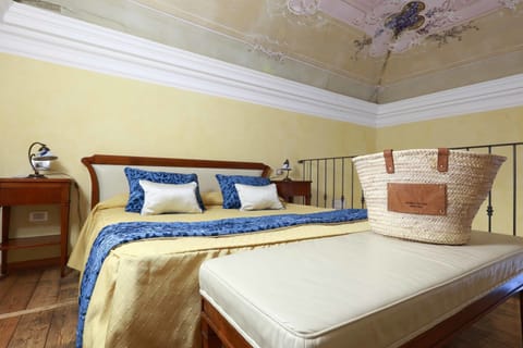 Superior Room | Minibar, in-room safe, individually decorated, individually furnished