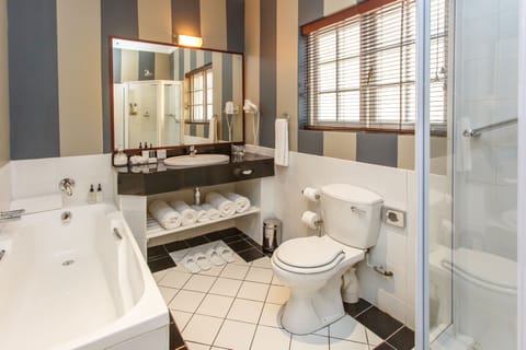 Luxury Room, 1 King Bed | Bathroom | Separate tub and shower, free toiletries, hair dryer, bathrobes