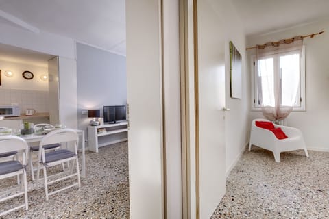 Apartment, 1 Bedroom | Living area | Flat-screen TV