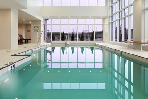 Indoor pool, open 6:00 AM to 11:00 PM, sun loungers