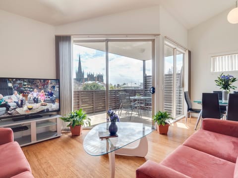 Deluxe Apartment, 2 Bedrooms | Living area | Flat-screen TV, DVD player
