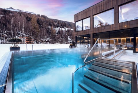 Indoor pool, outdoor pool, open 7:00 AM to 8:00 PM, pool umbrellas