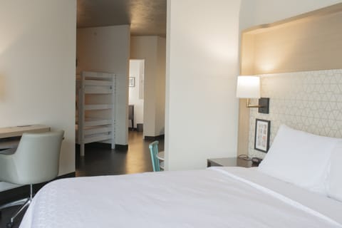 Suite, Multiple Beds | In-room safe, desk, iron/ironing board, free WiFi