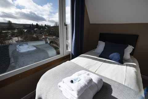 Basic Triple Room, 3 Twin Beds | In-room safe, desk, free WiFi, bed sheets