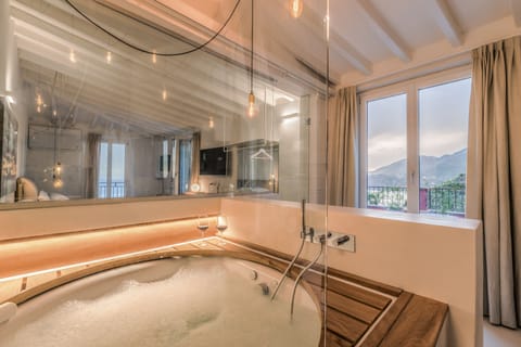 Honeymoon Suite, Jetted Tub | Bathroom | Designer toiletries, hair dryer, slippers, bidet