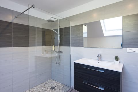 Apartment, Poolside | Bathroom | Shower, rainfall showerhead, hair dryer, bathrobes