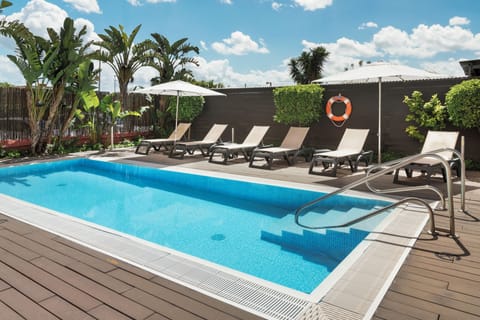 Outdoor pool, sun loungers
