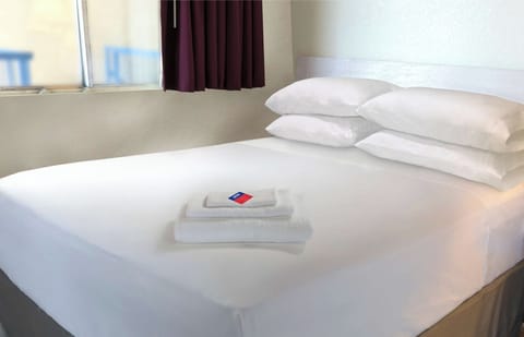 Individually furnished, desk, blackout drapes, rollaway beds