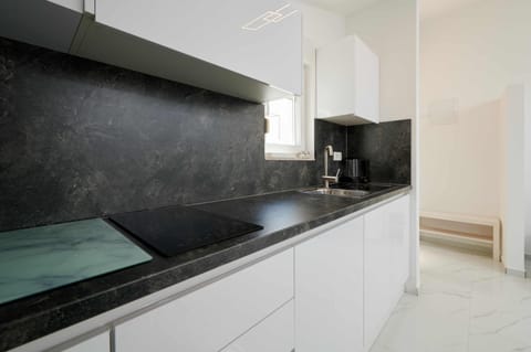 Standard Apartment, 1 Bedroom, Balcony, Sea View | Private kitchenette | Fridge, microwave, stovetop, electric kettle