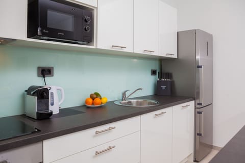 Superior Apartment, 2 Bedrooms, Sea View | Private kitchen | Fridge, espresso maker, coffee/tea maker, electric kettle