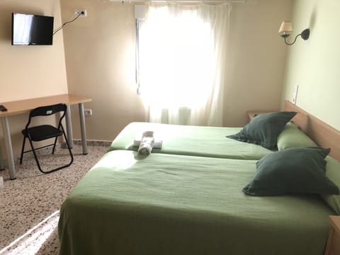 Double or Twin Room | Desk, free cribs/infant beds, free WiFi, bed sheets